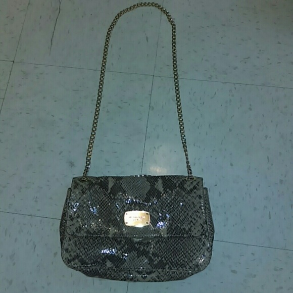 Micheal Kors snakeskin cross body purse
