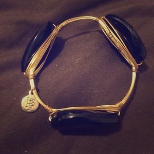 Bourbon and boweties black stone and gold bangle