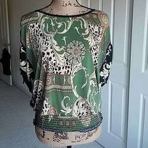 Dolman sleeve with ties and gathered hem