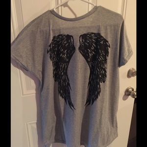 Gray shirt wing on back