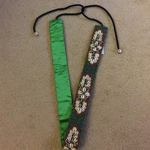 Patterned shell belt