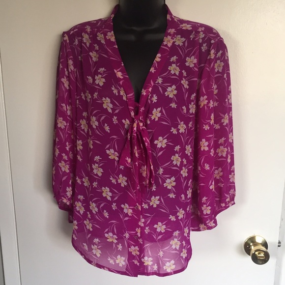 Sheer fuchsia with flowers design blouse.