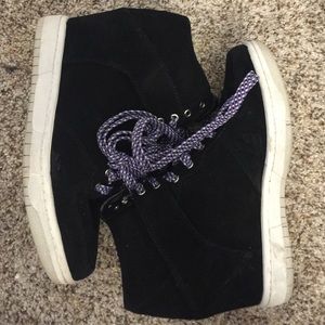 Black suede wedge sneaker by Steve Madden