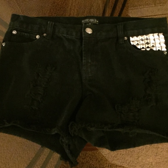 Distressed studded shorts
