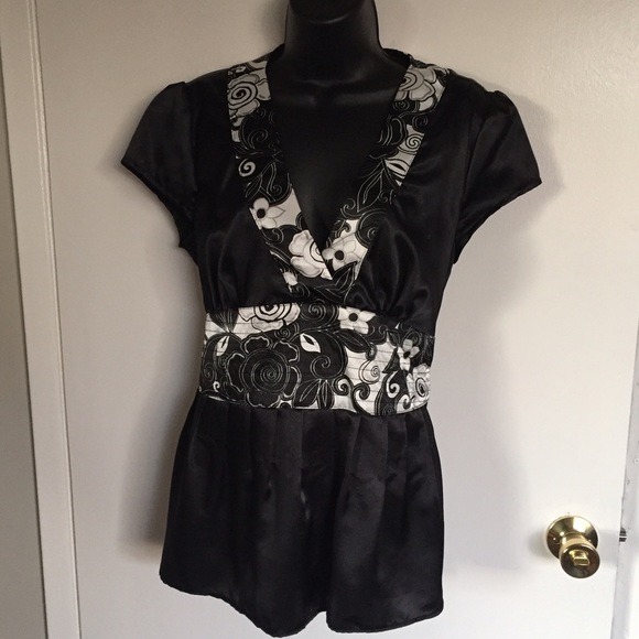 Black blouse with black/white floral accent