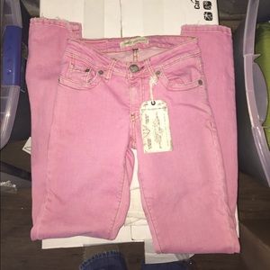 NEW! Pink distressed skinnies