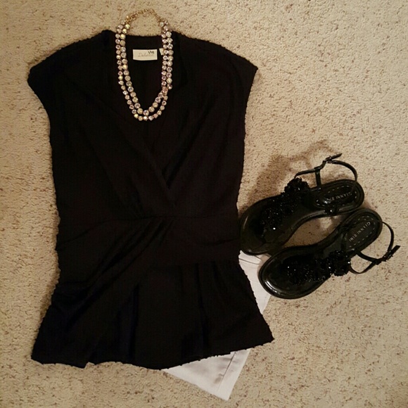 Anthropologie Dot Peplum knit top