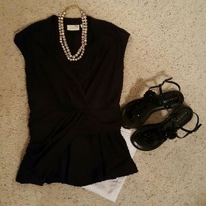 Anthropologie Dot Peplum knit top