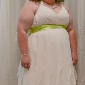 Size 18 wedding dress. Paid $500. No belt!