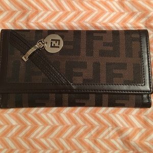 Wallet will hold checkbook and credit cards too