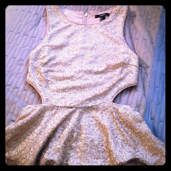 Gold sequin cutout peplum tank top