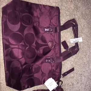 Coach purse, plum color. Brand new with tags!