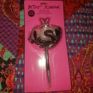 Besty Johnson pen/ pink ink.