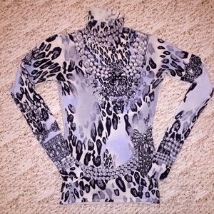 Patterned turtleneck Cache top