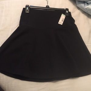 Black mid thigh length skirt