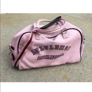 LULULEMON LEATHER CORAL PINK DUFFEL BAG