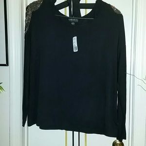 Black top with silver shoulder decoration