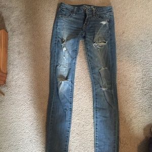 AE light washed ripped jeans