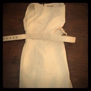 White form fitting belted dress