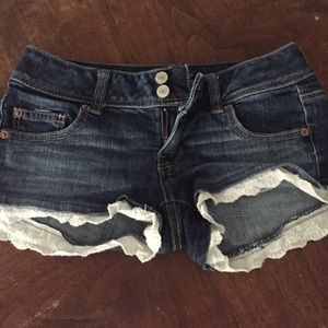 Dark jean shorts with lace detail