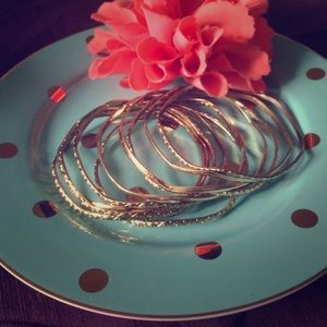 Gold chevron bangles