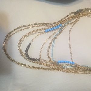 Long multi chain necklace