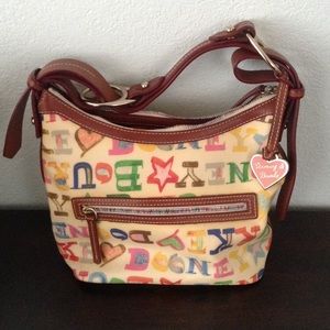 Dooney and Bourke purse with matching wallet.