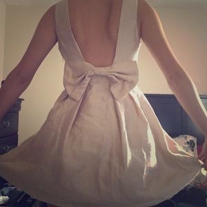 Elegant Pale Gold Dress with Bow Back