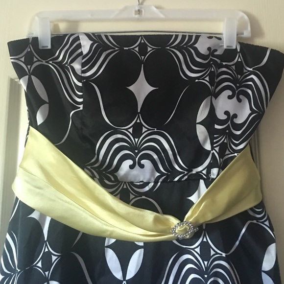 Black and white dress with yellow sash