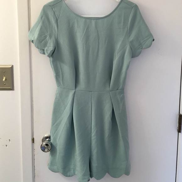 Romper with scalloped sleeves