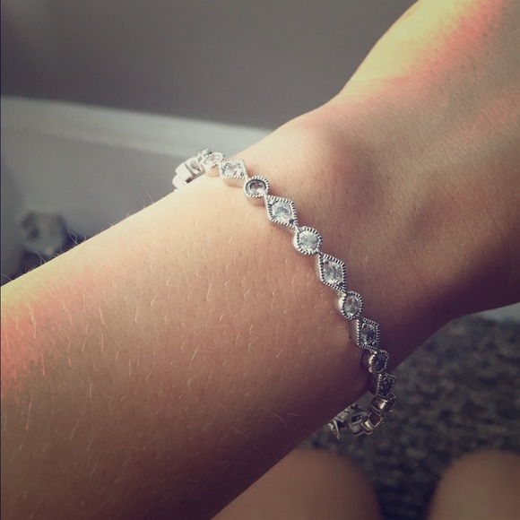 Silver bracelet with rhinestones