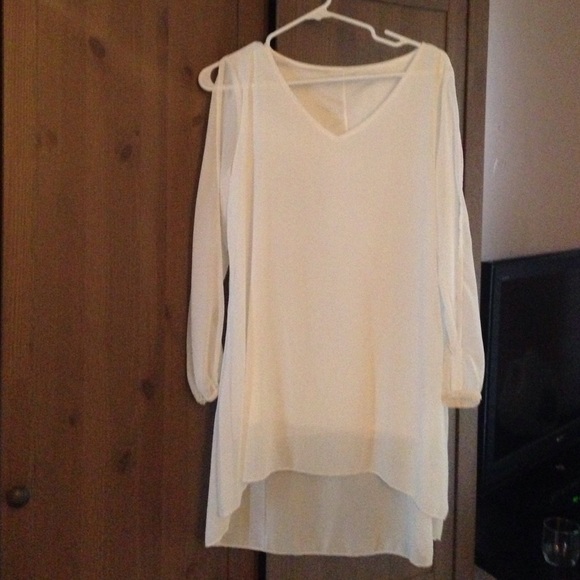 White dress with open sleeves