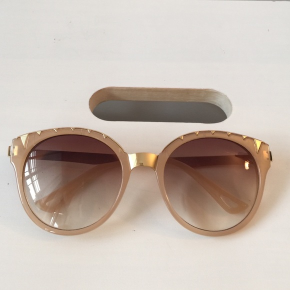 Gorgeous peachy sunglasses with gold trim