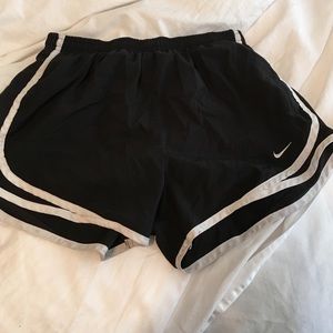 Black Nike running shorts