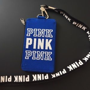 Unused pink wallet and lanyard