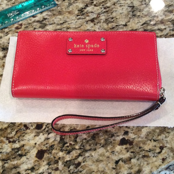 Red pebbled leather wristlet KATE SPADE