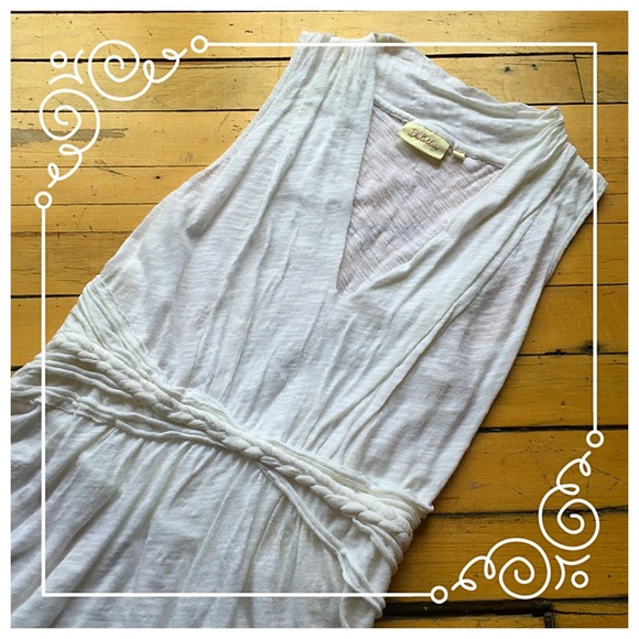 White sleeveless v-neck