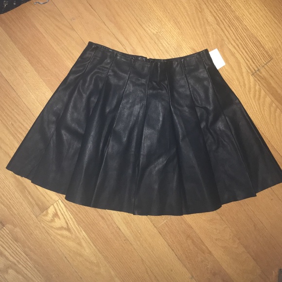 Black leather, pleated mini skirt Size 8.