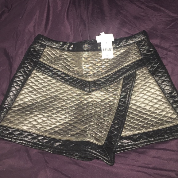 LF new with tags black and silver skort.
