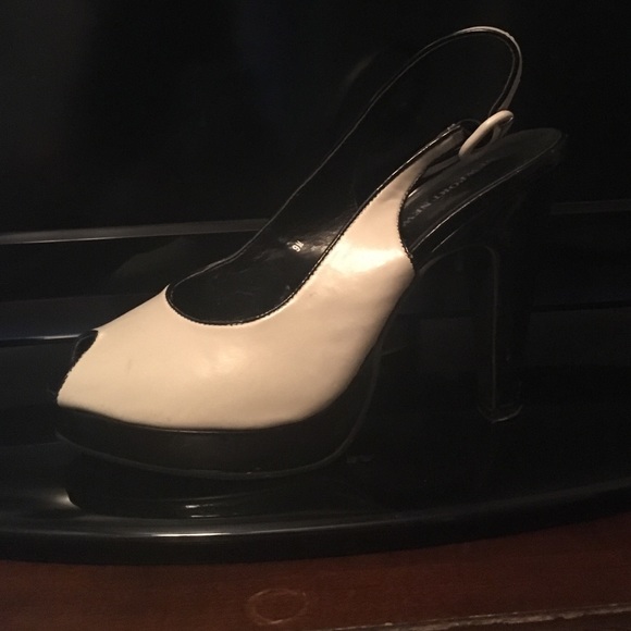 Cream and black sling back shoes. Open toe