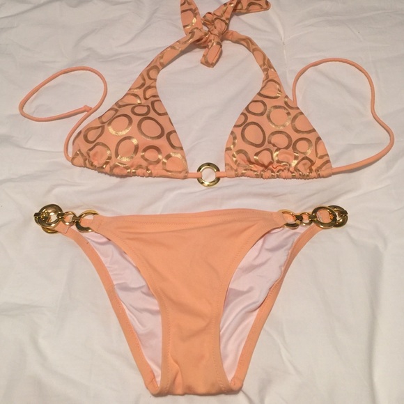 Peach bikini with gold ring accents