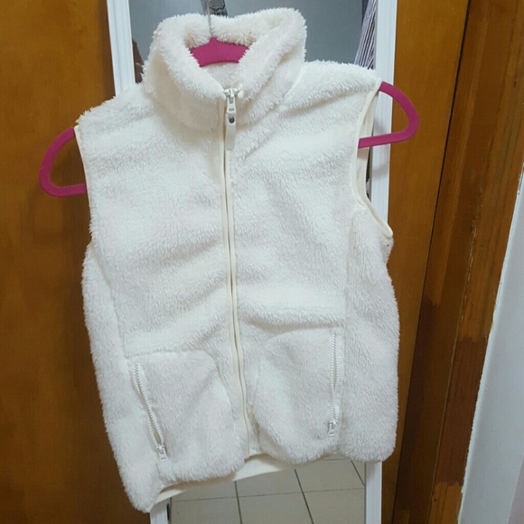 White fur vest