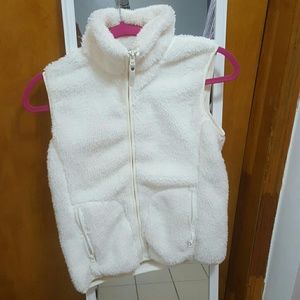 White fur vest