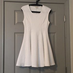 Francesca's White textured knee length dress.