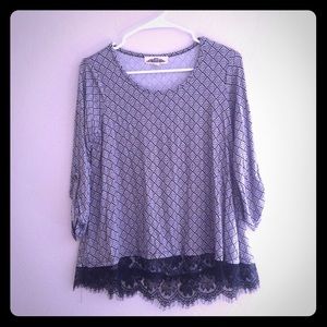 Hippie Rose 3/4 length back and white blouse.