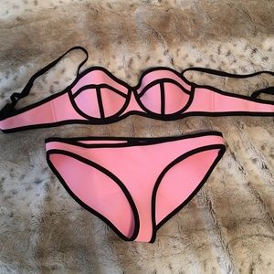 Triangl size small swim suit.
