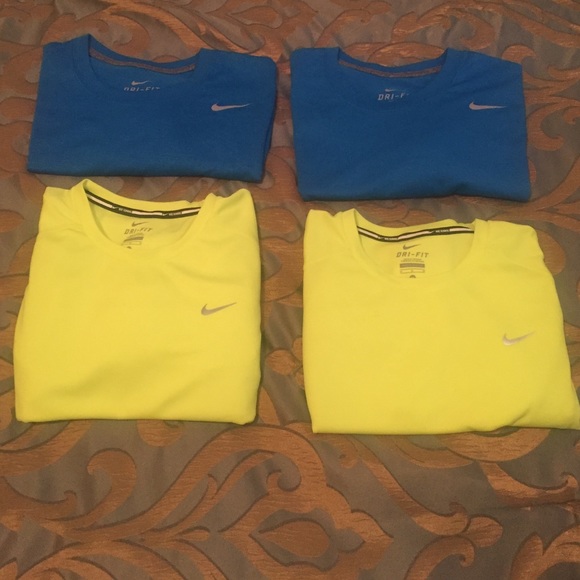 Four Nike T's