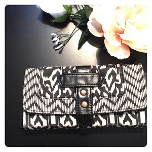 Fabric wallet with faux leather interior