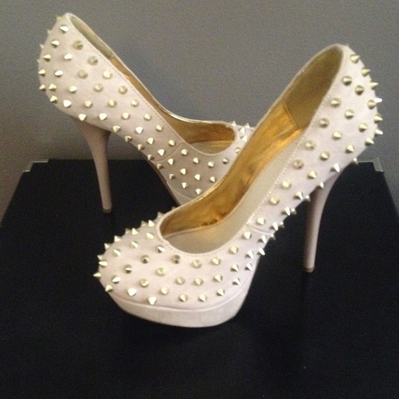 Soft pink spiked heels