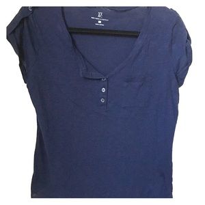 Short sleeve navy blue T-shirt.